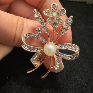 Elegant Gold and Crystal Brooch